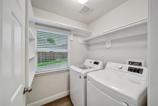 28006 Brendon Trail Ct, Spring, TX 77386 - laundry area with washer and dryer and wood finished floors