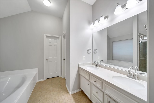28006 Brendon Trail Ct, Spring, TX 77386 - bathroom with a garden tub, double vanity, tile patterned flooring, and lofted ceiling