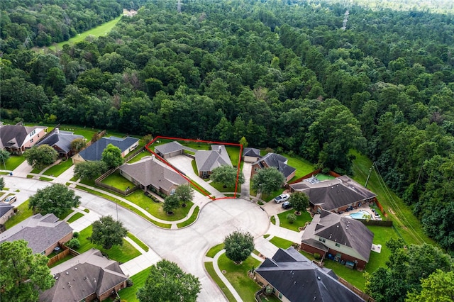 28006 Brendon Trail Ct, Spring, TX 77386 - aerial view of residential area featuring a heavily wooded area and property parcel outlined