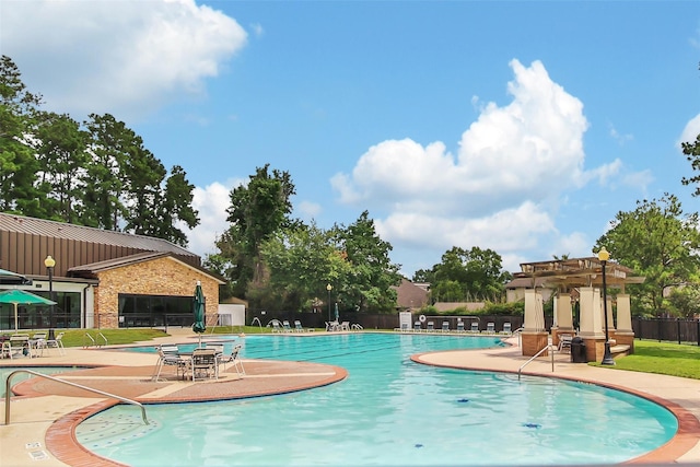 28006 Brendon Trail Ct, Spring, TX 77386 - community pool featuring a patio