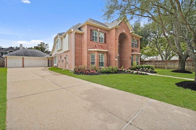 22419 Rippling Shore Ct, Katy, TX 77494 - traditional-style house featuring brick siding, concrete driveway, a detached garage, and roof with shingles