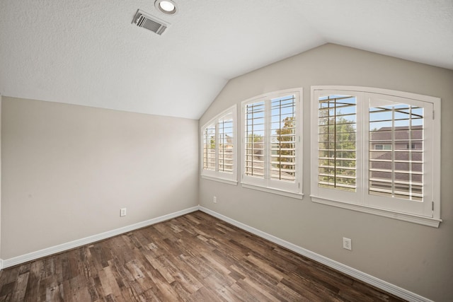 22419 Rippling Shore Ct, Katy, TX 77494 - additional living space with vaulted ceiling and dark wood finished floors