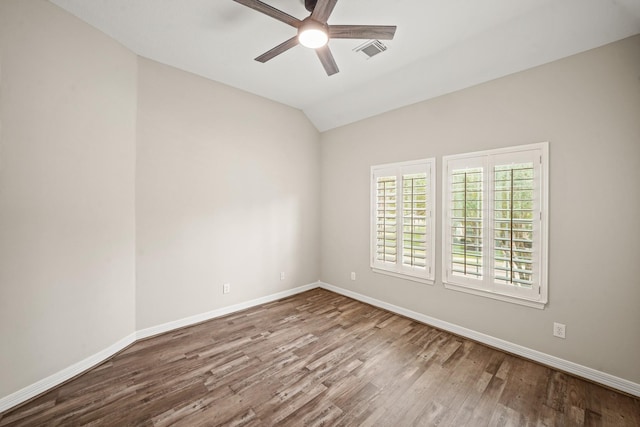 22419 Rippling Shore Ct, Katy, TX 77494 - spare room with a ceiling fan, wood finished floors, and lofted ceiling