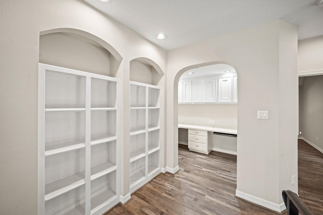 22419 Rippling Shore Ct, Katy, TX 77494 - corridor featuring wood finished floors, recessed lighting, and a desk
