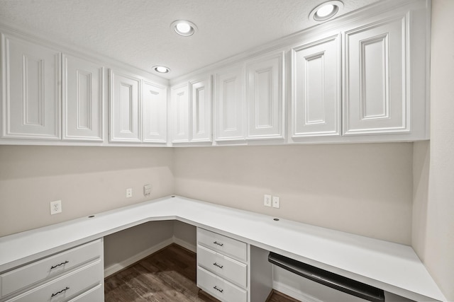 22419 Rippling Shore Ct, Katy, TX 77494 - unfurnished office with built in study area, dark wood finished floors, and recessed lighting