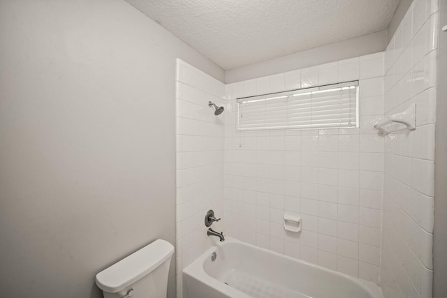 22419 Rippling Shore Ct, Katy, TX 77494 - bathroom featuring a textured ceiling and bathtub / shower combination