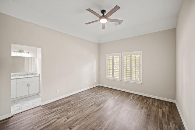 22419 Rippling Shore Ct, Katy, TX 77494 - unfurnished room featuring a ceiling fan and light wood-style flooring