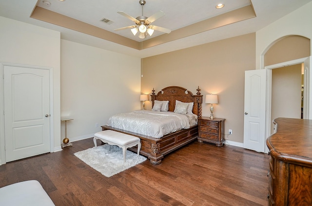 24914 Hazel Ranch Dr, Katy, TX 77494 - bedroom featuring a raised ceiling, wood finished floors, recessed lighting, and a ceiling fan