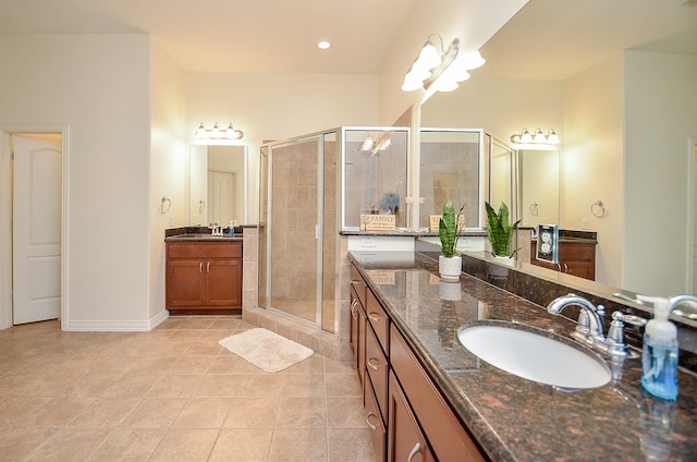24914 Hazel Ranch Dr, Katy, TX 77494 - full bathroom with a shower stall, two vanities, and tile patterned flooring