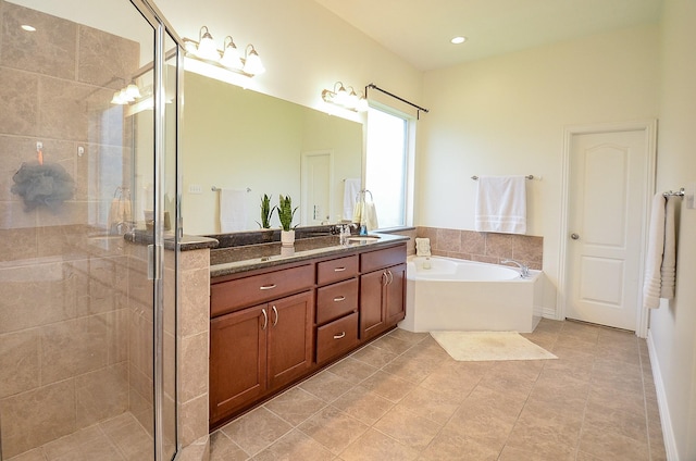 24914 Hazel Ranch Dr, Katy, TX 77494 - full bath featuring double vanity, a stall shower, a garden tub, and tile patterned flooring