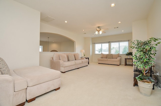 24914 Hazel Ranch Dr, Katy, TX 77494 - carpeted living room with ceiling fan, recessed lighting, and arched walkways