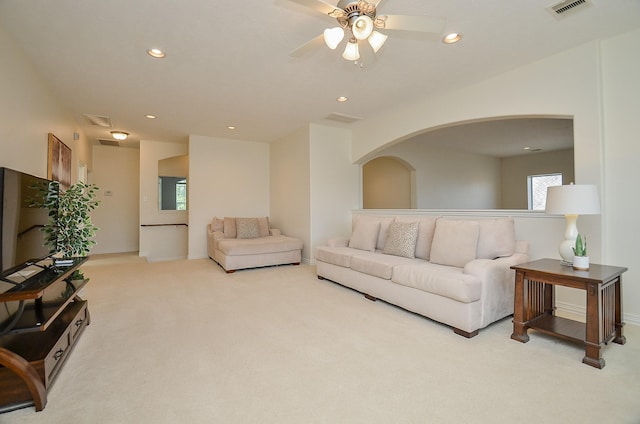 24914 Hazel Ranch Dr, Katy, TX 77494 - living room with carpet floors, recessed lighting, a ceiling fan, and arched walkways