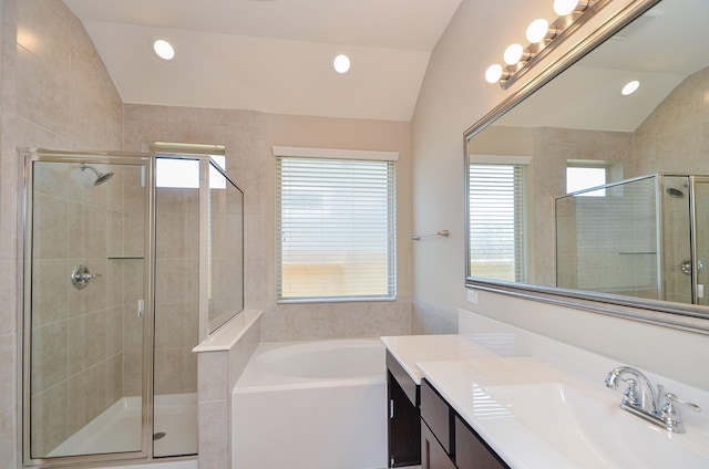 3238 Montclair Orchard Trce, Spring, TX 77386 - full bathroom featuring vanity, a bath, a shower stall, lofted ceiling, and healthy amount of natural light
