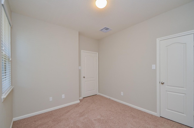 3238 Montclair Orchard Trce, Spring, TX 77386 - unfurnished bedroom featuring light colored carpet and multiple windows