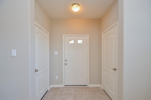 3238 Montclair Orchard Trce, Spring, TX 77386 - foyer entrance featuring light tile patterned flooring and baseboards