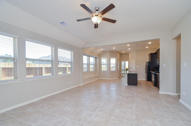 3238 Montclair Orchard Trce, Spring, TX 77386 - unfurnished living room featuring light tile patterned floors, vaulted ceiling, a ceiling fan, and recessed lighting