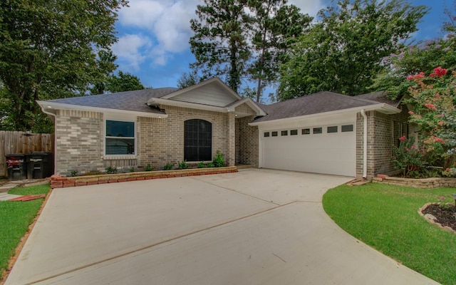 22718 Red Pine Dr, Tomball, TX 77375 - ranch-style house with brick siding, a garage, driveway, and a shingled roof