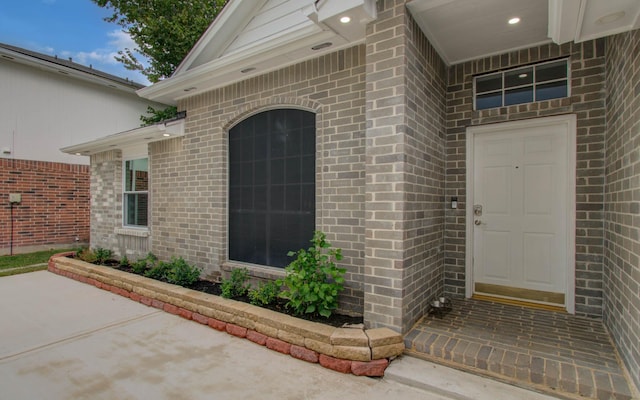 22718 Red Pine Dr, Tomball, TX 77375 - entrance to property featuring brick siding and a patio