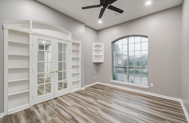 22718 Red Pine Dr, Tomball, TX 77375 - unfurnished room featuring wood finished floors, a ceiling fan, french doors, and recessed lighting