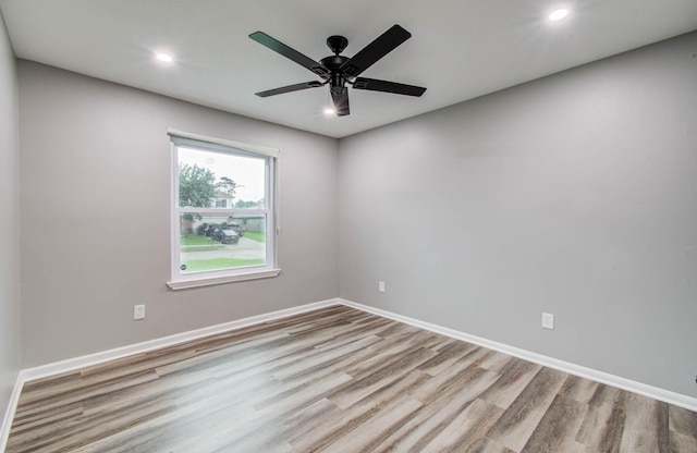 22718 Red Pine Dr, Tomball, TX 77375 - empty room featuring wood finished floors, recessed lighting, and a ceiling fan