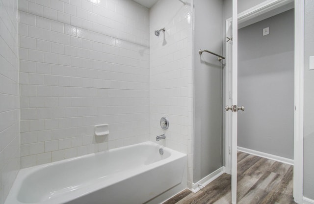 22718 Red Pine Dr, Tomball, TX 77375 - full bathroom with wood finished floors and shower / tub combination