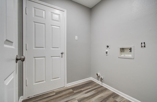 22718 Red Pine Dr, Tomball, TX 77375 - laundry area featuring hookup for a gas dryer, electric dryer hookup, wood finished floors, and hookup for a washing machine
