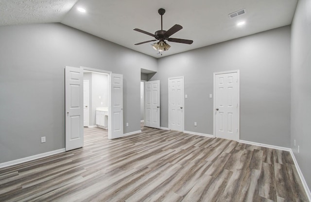 22718 Red Pine Dr, Tomball, TX 77375 - unfurnished bedroom featuring wood finished floors, high vaulted ceiling, recessed lighting, and a ceiling fan