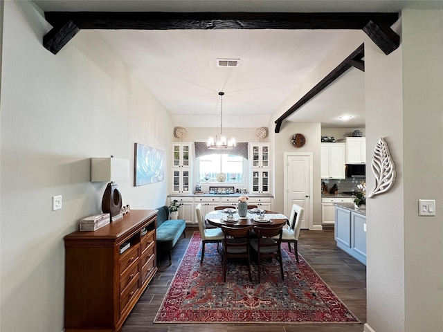 9327 Victory Canyon Ln, Tomball, TX 77375 - dining area featuring a chandelier and dark wood-style floors