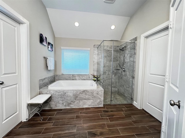 9327 Victory Canyon Ln, Tomball, TX 77375 - full bath featuring lofted ceiling, a bath, a shower stall, recessed lighting, and wood finish floors