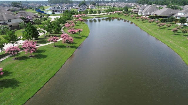 9327 Victory Canyon Ln, Tomball, TX 77375 - aerial perspective of suburban area with a large body of water