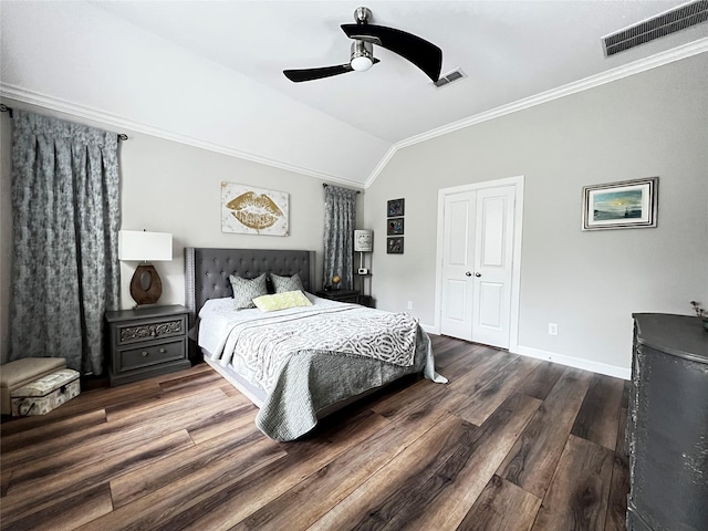 9327 Victory Canyon Ln, Tomball, TX 77375 - bedroom with lofted ceiling, crown molding, wood finished floors, ceiling fan, and a closet