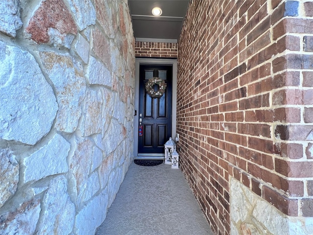 9327 Victory Canyon Ln, Tomball, TX 77375 - doorway to property with brick siding