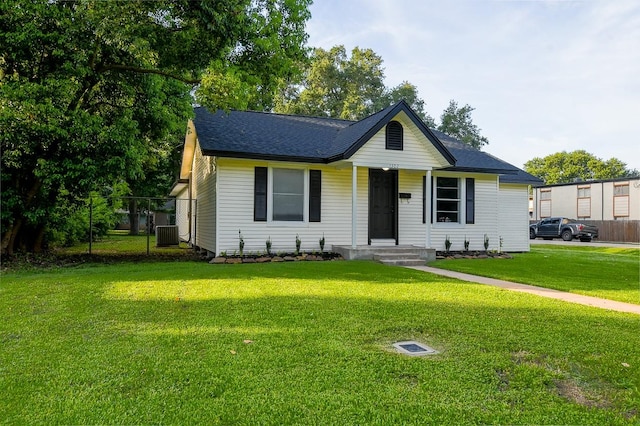 1302 W Adoue St, Alvin, TX 77511 - ranch-style home featuring roof with shingles