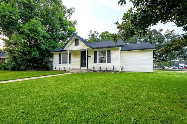 1302 W Adoue St, Alvin, TX 77511 - single story home featuring a front lawn and roof with shingles