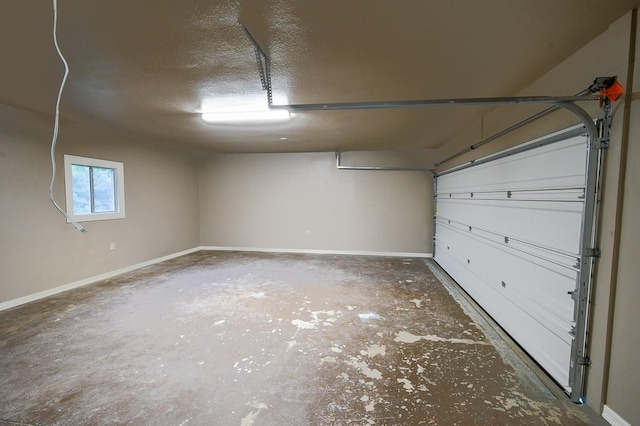 1302 W Adoue St, Alvin, TX 77511 - garage with baseboards