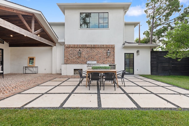 7202 Hartland Ave, Houston, TX 77055 - view of patio featuring a grill and outdoor dining area