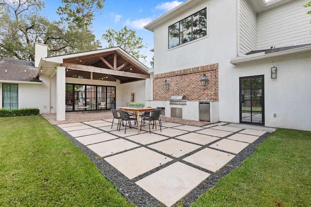 7202 Hartland Ave, Houston, TX 77055 - view of patio featuring an outdoor kitchen
