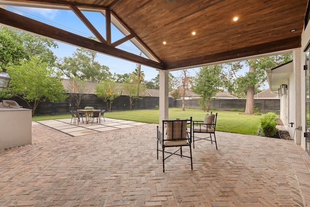 7202 Hartland Ave, Houston, TX 77055 - fenced backyard with outdoor dining space and a patio