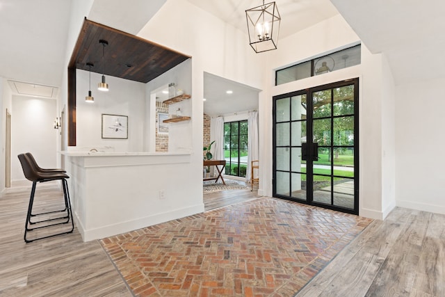 7202 Hartland Ave, Houston, TX 77055 - foyer featuring a high ceiling and a chandelier