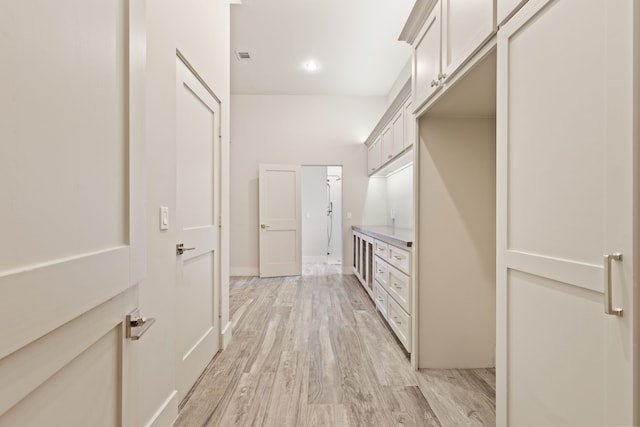 7202 Hartland Ave, Houston, TX 77055 - hallway featuring light wood finished floors