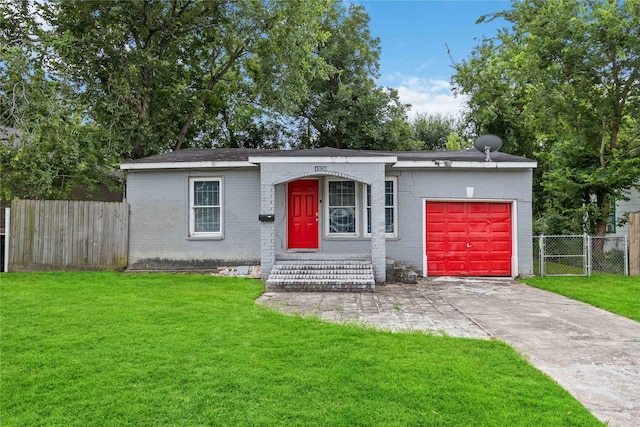 4526 Kingsbury St, Houston, TX 77021 - view of front facade with an attached garage, concrete driveway, and brick siding
