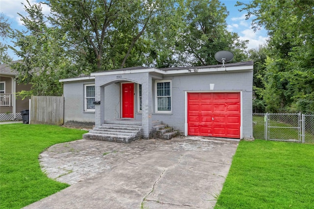 4526 Kingsbury St, Houston, TX 77021 - view of front of property featuring an attached garage, driveway, brick siding, and a gate