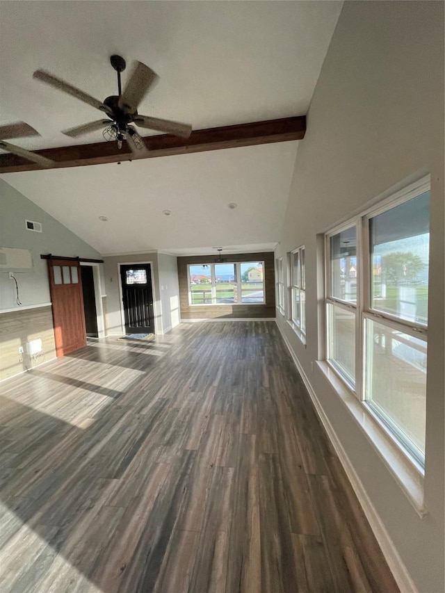 126 2nd Ave, Onalaska, TX 77360 - unfurnished living room featuring beam ceiling, dark wood-type flooring, a ceiling fan, and high vaulted ceiling