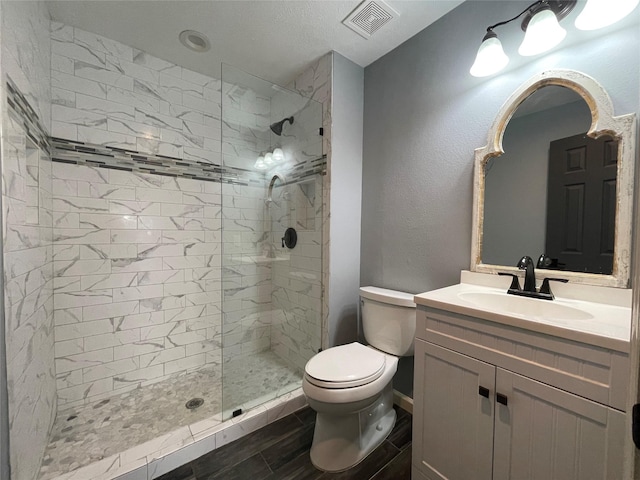 126 2nd Ave, Onalaska, TX 77360 - full bathroom with a shower stall, vanity, and wood finish floors