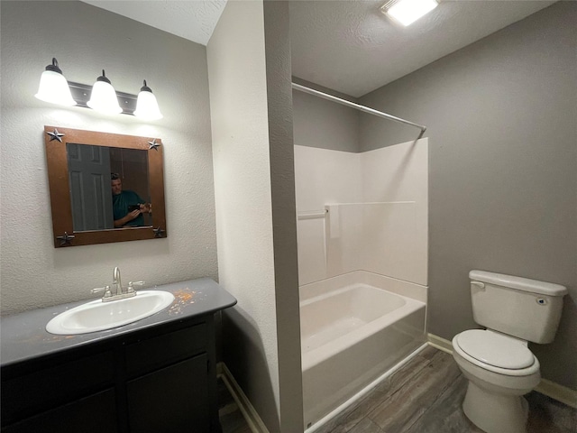 126 2nd Ave, Onalaska, TX 77360 - full bathroom featuring wood finished floors, vanity, and tub / shower combination
