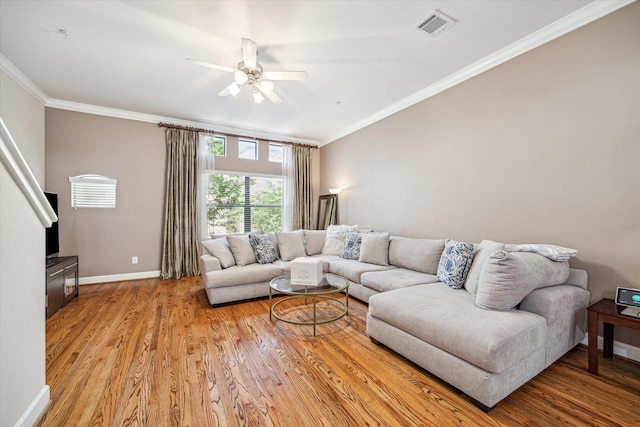 11315 S Main St Unit 1205, Houston, TX 77025 - living area featuring ceiling fan, ornamental molding, and light wood finished floors