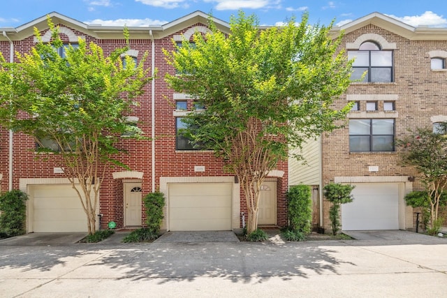 11315 S Main St Unit 1205, Houston, TX 77025 - multi unit property featuring brick siding, driveway, and an attached garage