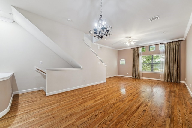 11315 S Main St Unit 1205, Houston, TX 77025 - unfurnished living room with light wood-type flooring, a ceiling fan, a chandelier, and crown molding