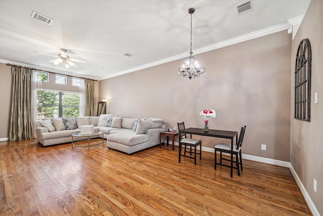 11315 S Main St Unit 1205, Houston, TX 77025 - living area featuring crown molding, ceiling fan, wood finished floors, and a chandelier