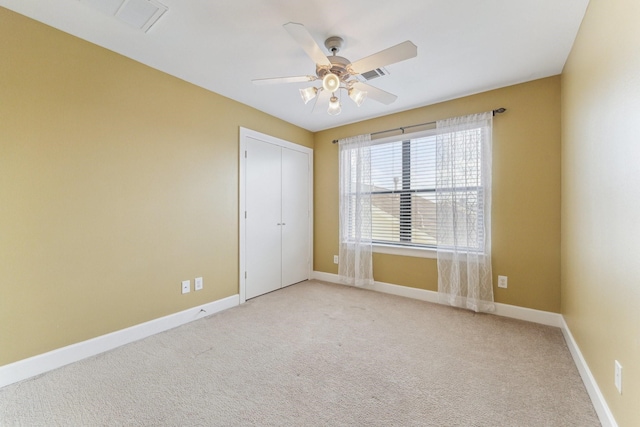 11315 S Main St Unit 1205, Houston, TX 77025 - unfurnished bedroom featuring carpet flooring, a closet, and a ceiling fan